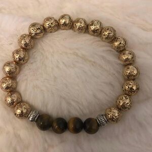 New Gold Tone Lava Stones Diffuser Bracelet
With Tiger Eye Gemstones Stretchy
